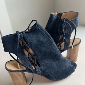 Cute, never worn, blue lace up heels!